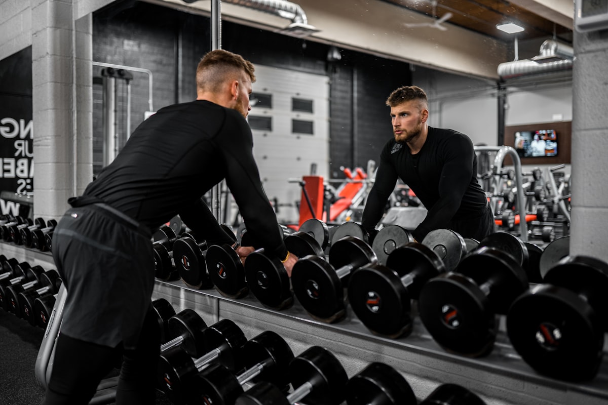 Certified fitness trainer working with client